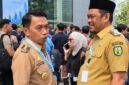 Bupati Luwu H. Patahudding bersama Bupati Sidrap Syaharuddin Alrif di lokasi Rakornas TPAKD, Jakarta, Kamis (22/10). (ist)